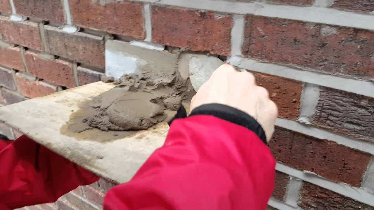 Close-up of mortar application technique